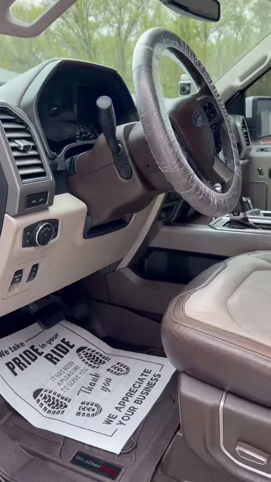 The same Ford F-150 driver area after interior detailing