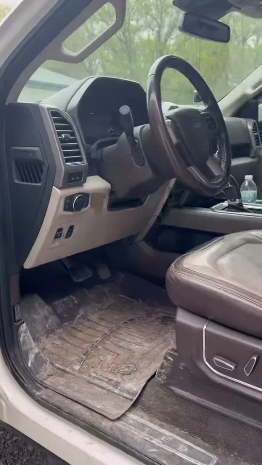 Ford F-150 driver floor before interior detailing